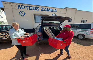 AGS Zambia Partners with APTERS to Create Mobility Aids from Recycled Moving Boxes for Disabled Children